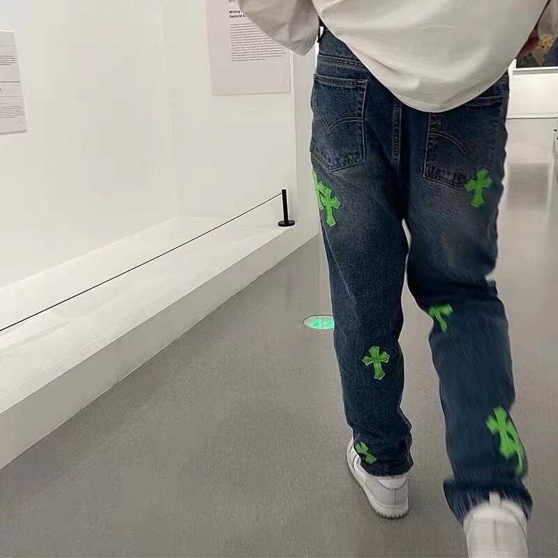 2022 High Street Fashion Sanskrit Letter Chrome Jeans Men's and Women's Hip-Hop Cross Patch Leather Denim Trousers High Quality